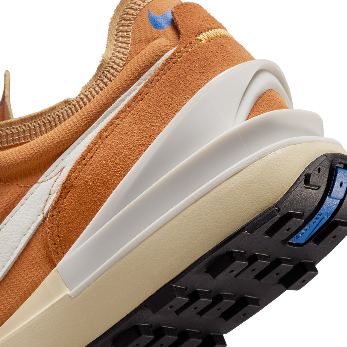 Cut the chill in the latest Nike Waffle One remix. A durable heel clip adds energy while a mixture of hairy suedes and a felt Swoosh logo gets you ready to hit the streets. The new springy midsole has the classic wedge shape while the updated Waffle outsole provides a level of support and traction you have to feel to believe.