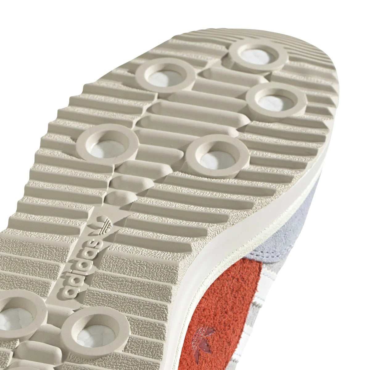 Originally a lightweight racing shoe — the adidas SL 72 trainers didn't only make an impression on any track, but at the track of the largest sporting event in history. Still super light, and still grounded in minimalism, this modern version rides on a combination gum and solid rubber outsole, and is finished with a durable mudguard and TPU heel clip for stability.