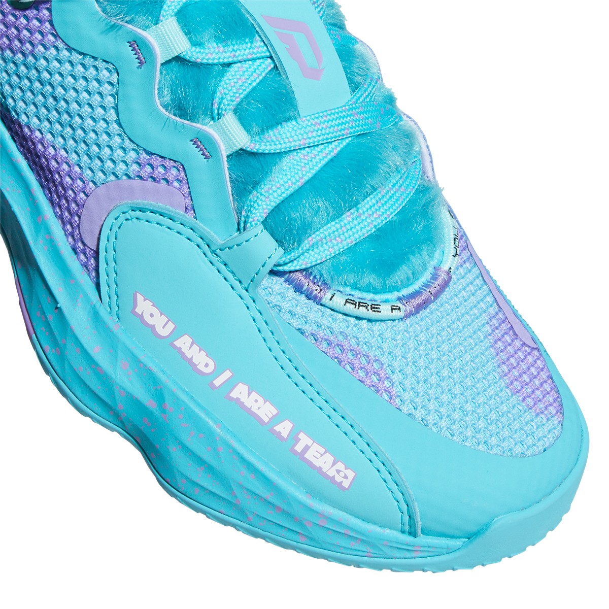 It's not easy to be at the top of your game in basketball AND hip hop. The DAME 7 EXTPLY collection mixes the love for both of Damian Lillard's passions. Each "track" is studio inspired. Dame never cheats the grind, asserting himself as the best baller to ever grace the booth, period. Introducing: Dame D.O.L.L.A. This juniors' edition of the Dame 7 shoes feature graphics inspired by Sulley, everybody's favorite scarer from Disney Pixar's "Monsters, Inc."