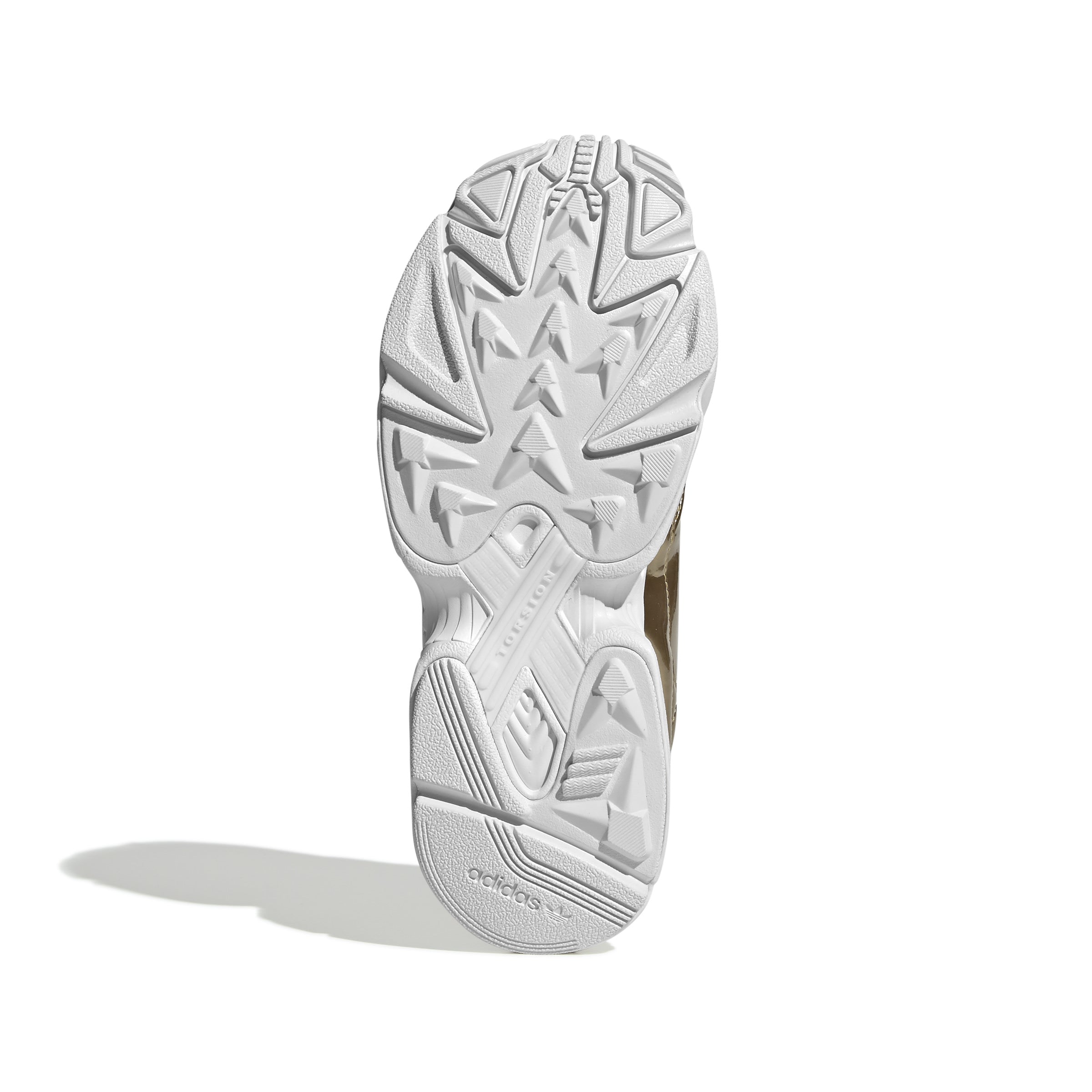 Confident '90s vibes inspire these throwback shoes. They shine bright with an eye-catching metallic synthetic upper. A contrast "X" on the outsole marks the Torsion System, a Falcon signature.