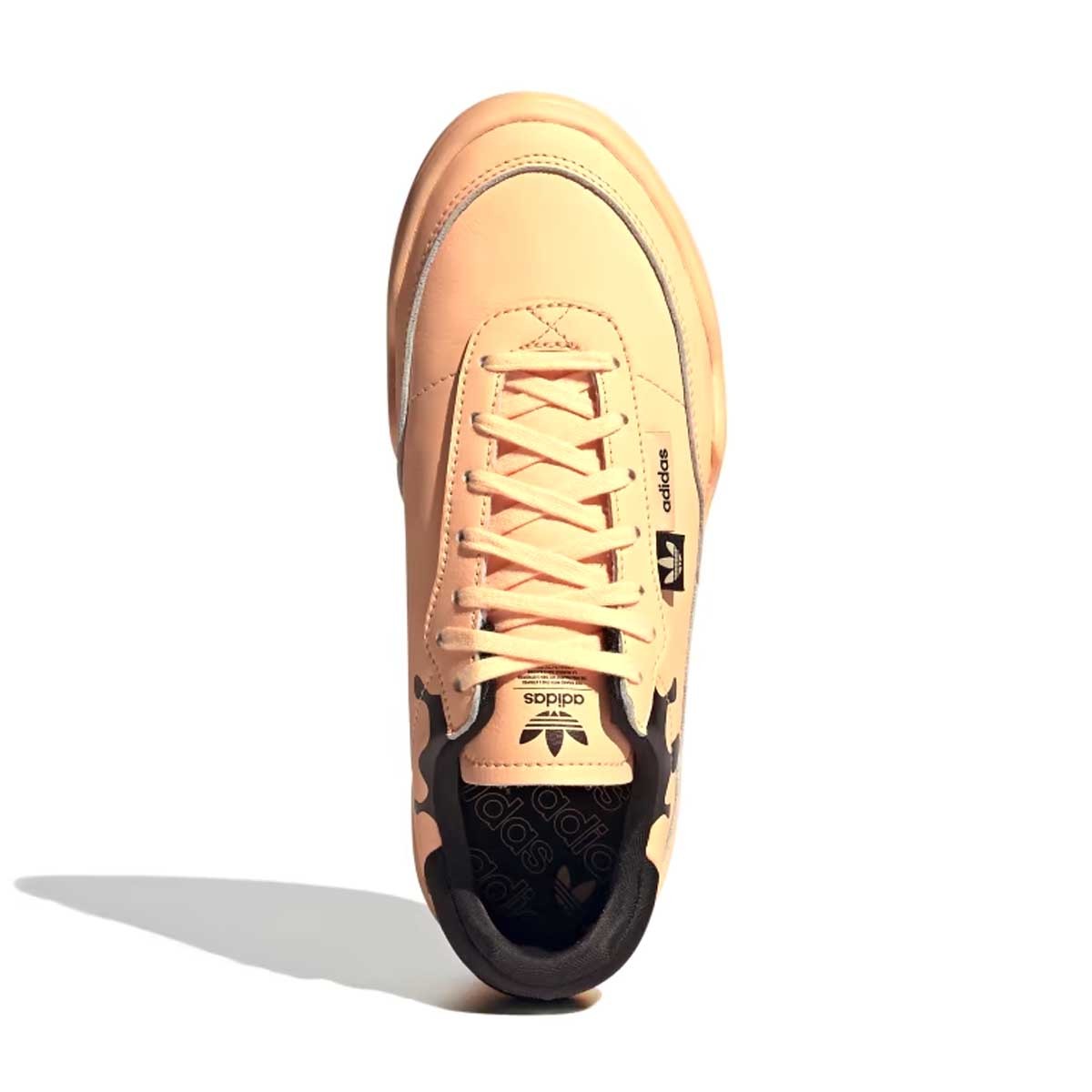 Lightweight and stylish. That's what the adidas Her Court shoes are all about. A beautiful creamsicle orange leather upper stands out right away. Wear them with dark-coloured jeans or pair the eye-catching paint-drip graphic with a no-sock look. Keep that pep in your step with a plush memory foam sockliner that keeps you comfortable all day long.