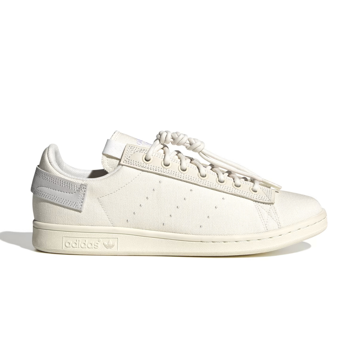 What's even better than recycled plastic? No plastic. That's why these shoes are made with nature. These adidas Stan Smith trainers bring together the best of both worlds, with the classic cues you've come to love (think perforation, simplicity and a low-profile silhouette) and natural materials like hemp, canvas and nubuck. The result is a handcrafted look marked by heavy stitch lines and a neutral palette. A natural rubber outsole offers grip and a smooth sign-off.