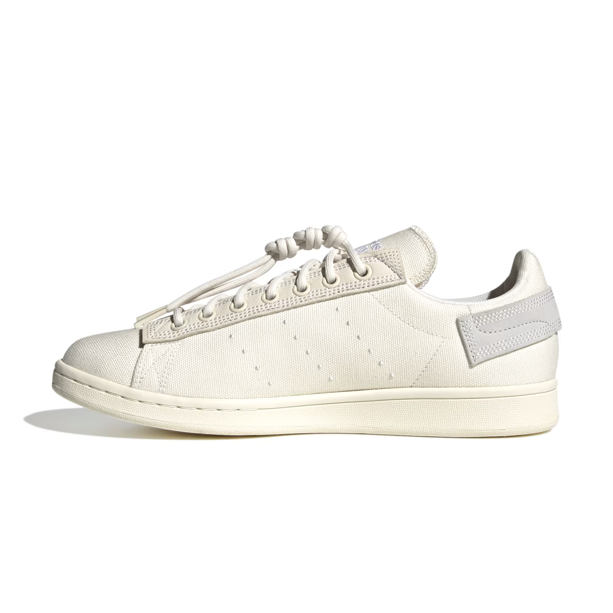 What's even better than recycled plastic? No plastic. That's why these shoes are made with nature. These adidas Stan Smith trainers bring together the best of both worlds, with the classic cues you've come to love (think perforation, simplicity and a low-profile silhouette) and natural materials like hemp, canvas and nubuck. The result is a handcrafted look marked by heavy stitch lines and a neutral palette. A natural rubber outsole offers grip and a smooth sign-off.