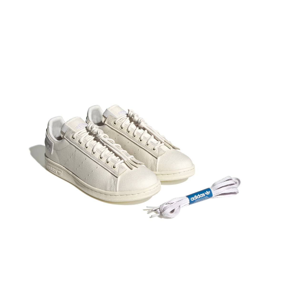 What's even better than recycled plastic? No plastic. That's why these shoes are made with nature. These adidas Stan Smith trainers bring together the best of both worlds, with the classic cues you've come to love (think perforation, simplicity and a low-profile silhouette) and natural materials like hemp, canvas and nubuck. The result is a handcrafted look marked by heavy stitch lines and a neutral palette. A natural rubber outsole offers grip and a smooth sign-off.