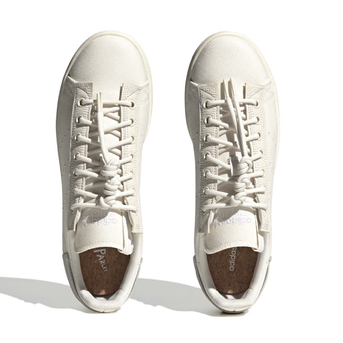 What's even better than recycled plastic? No plastic. That's why these shoes are made with nature. These adidas Stan Smith trainers bring together the best of both worlds, with the classic cues you've come to love (think perforation, simplicity and a low-profile silhouette) and natural materials like hemp, canvas and nubuck. The result is a handcrafted look marked by heavy stitch lines and a neutral palette. A natural rubber outsole offers grip and a smooth sign-off.