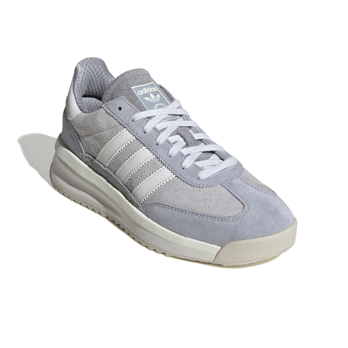 Originally a lightweight racing shoe — the adidas SL 72 trainers didn't only make an impression on any track, but at the track of the largest sporting event in history. Still super light, and still grounded in minimalism, this modern version rides on a combination gum and solid rubber outsole, and is finished with a durable mudguard and TPU heel clip for stability.